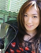 Asian cutie shows off motorcycle and more